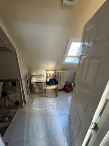 Small, tidy room with storage options.